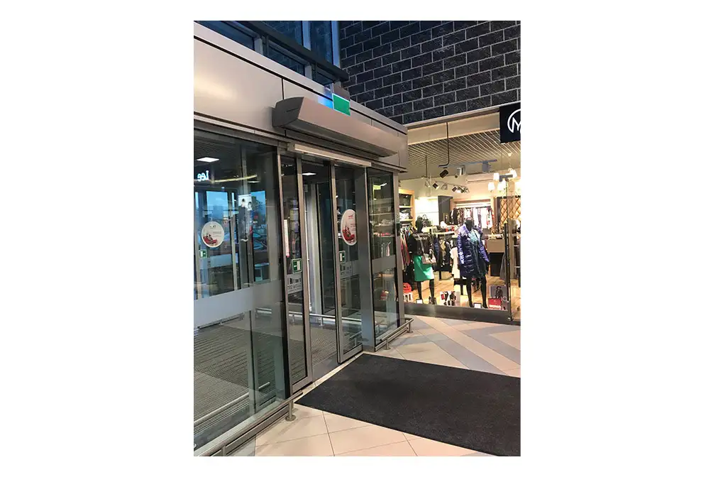 A warm air door heater for commercial applications powered by hot water or electric heaters used in shopping centres, stores, restaurant, or an airport from Flexiheat UK